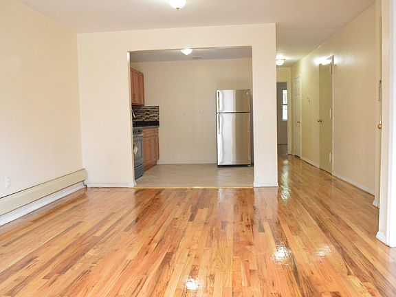 LIVING AREA /DINING AREA WITH POLISHED WOOD FINISHES