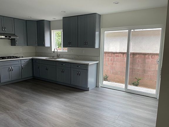 Kitchen and dining area with patio door