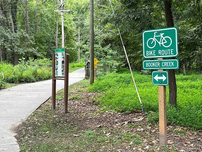 Booker Creek Greenway and Bike Route is a short walking distance away.