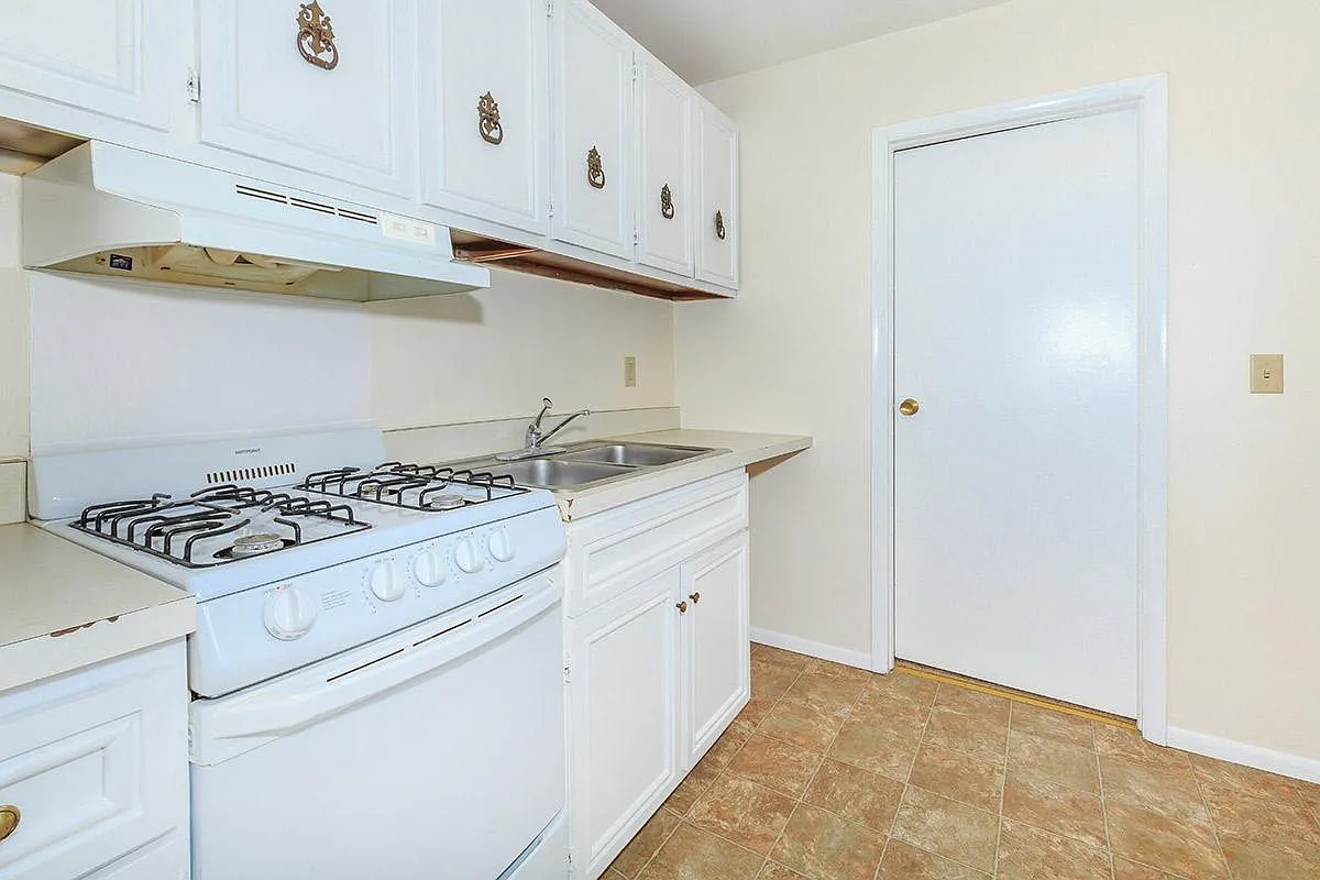 Village Apartments — Photo 4