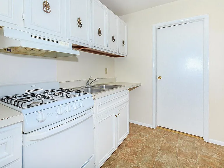 Village Apartments — Photo 4