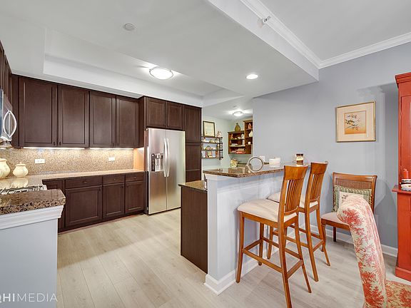 4th image of 400 Village Grn Unit 205