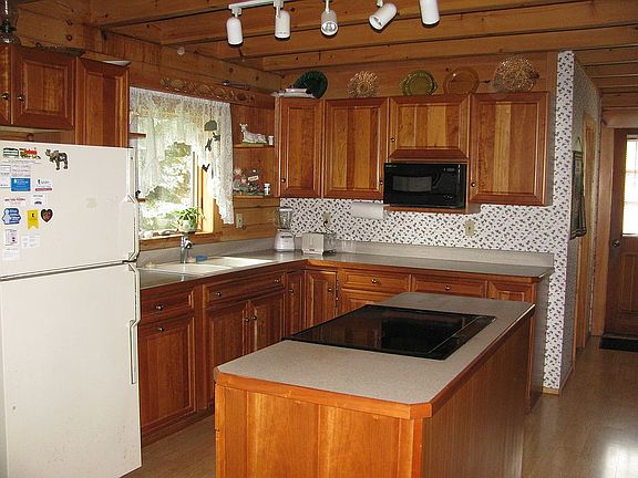 Kitchen -natural cherry cab.