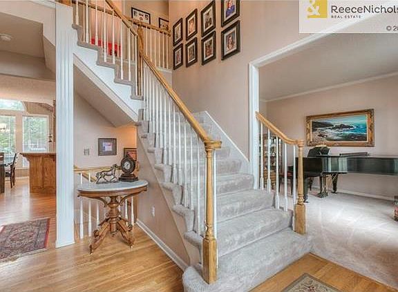 A dramatic two story entry welcomes you in to this livable home.