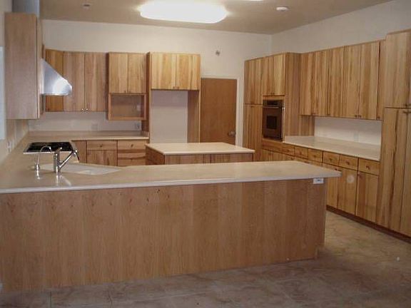 Custom kitchen w/ 6 burner gas stove