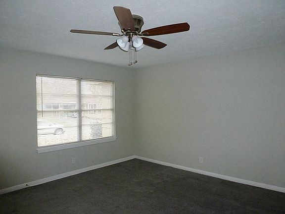 Light and bright living area with fresh paint, new ceiling and and new carpet