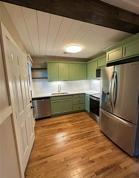 Stunning kitchen with High End Appliances, all new cabinets and fixtures.