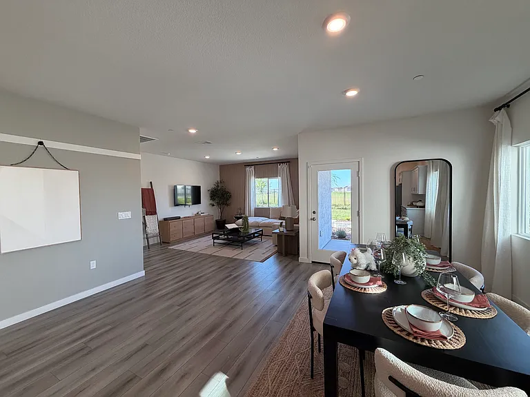 Great Room (will be larger in the home, the door has been moved)