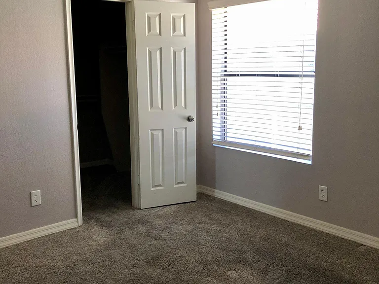 master bedroom leading to walk in closet