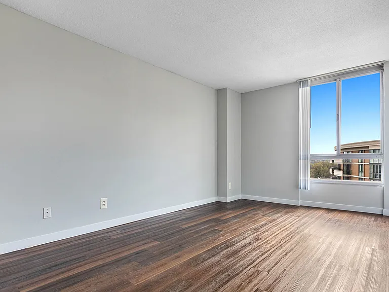 Large bedrooms with wood flooring throughout