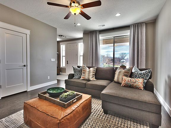 The main floor provides are warm and inviting living space, with access to the garage and a half bath.