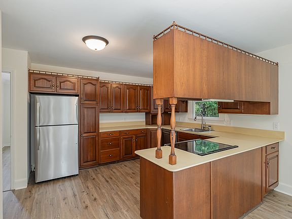 Kitchen with new SS fridge, Oven and dishwasher