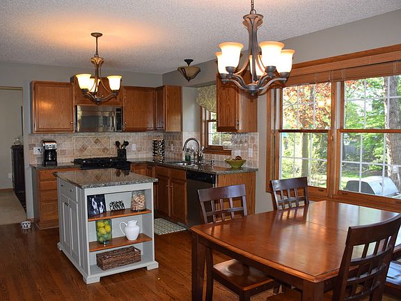 Eat-in formal dining space is located in the kitchen w/plenty of natural light