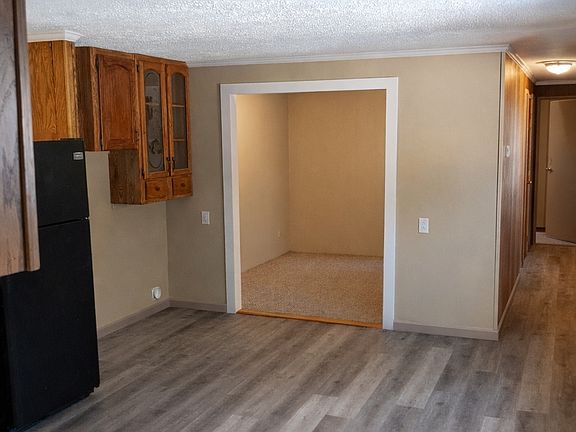Kitchen looking into Living Room entry