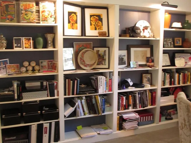 office or room with built in custom book shelr