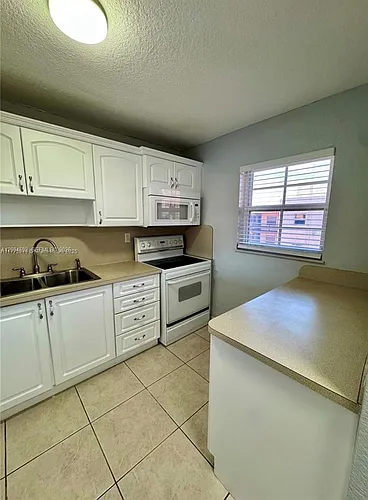 1855 W 60th St #446 Photo 1