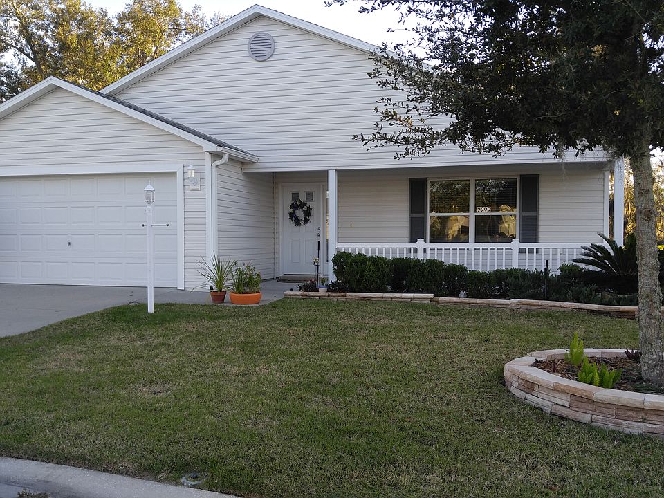 Front porch, hardscaped beds