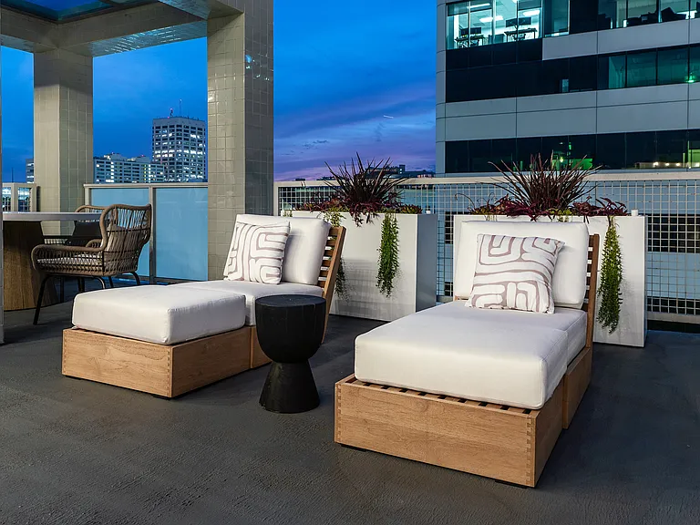 Serenity and Style: Lounge Chairs on Riva's Rooftop Deck