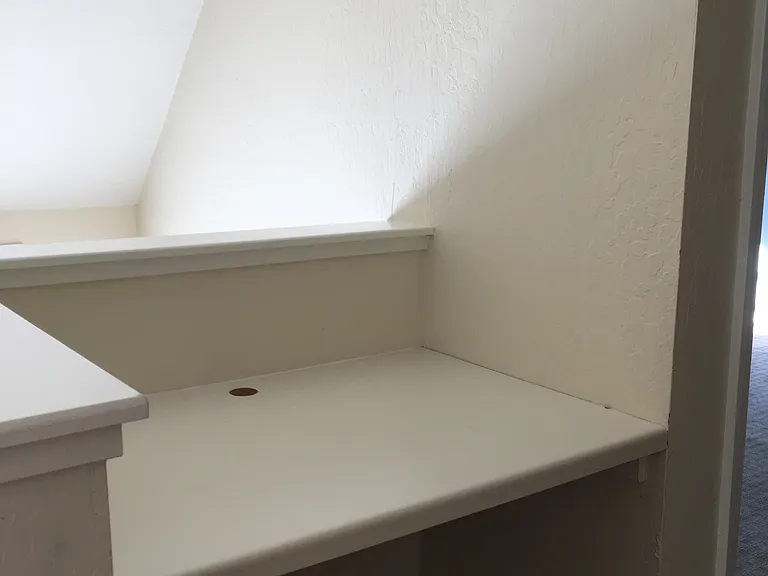built in desk in upper hallway