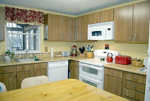 Kitchen w/ new GE Profile Electric Double Oven & GE Advantium 120 Microwave