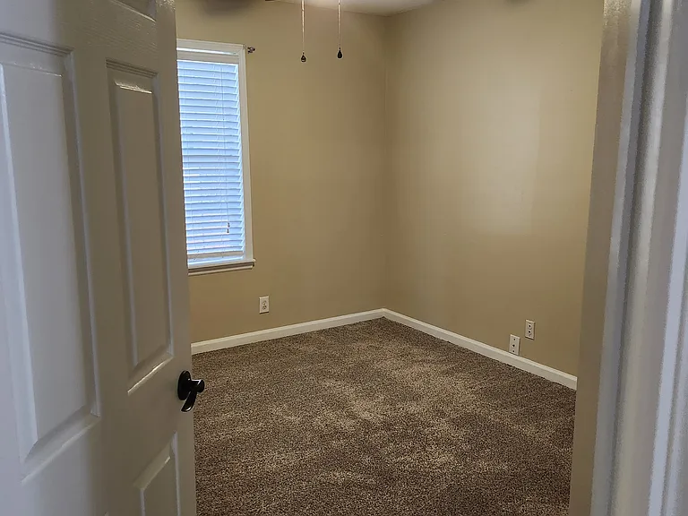 Bedroom#2: Modern fan, new carpet and spacious closet.