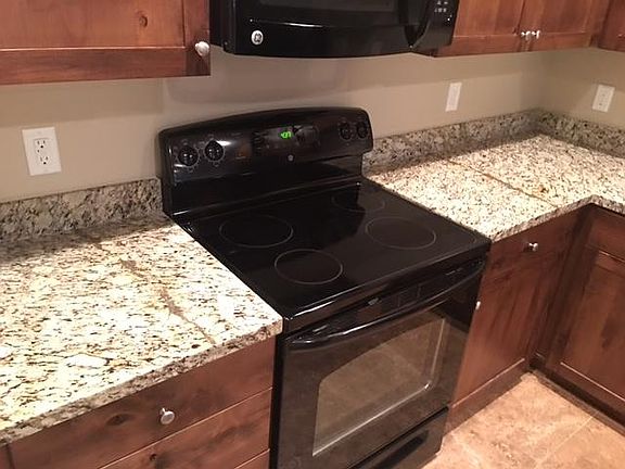 Kitchen showing Granite counter tops