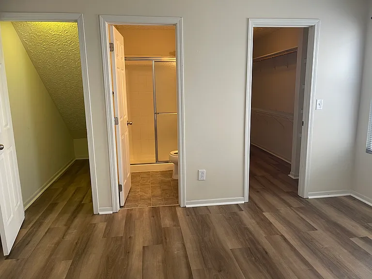 first floor master bedroom with 2 walk in closets