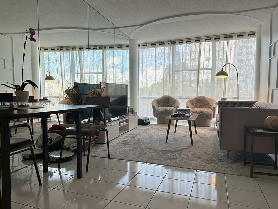1st image of 900 Bay Dr APT 211