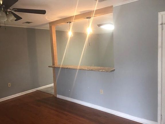 Another angle from living room into kitchen