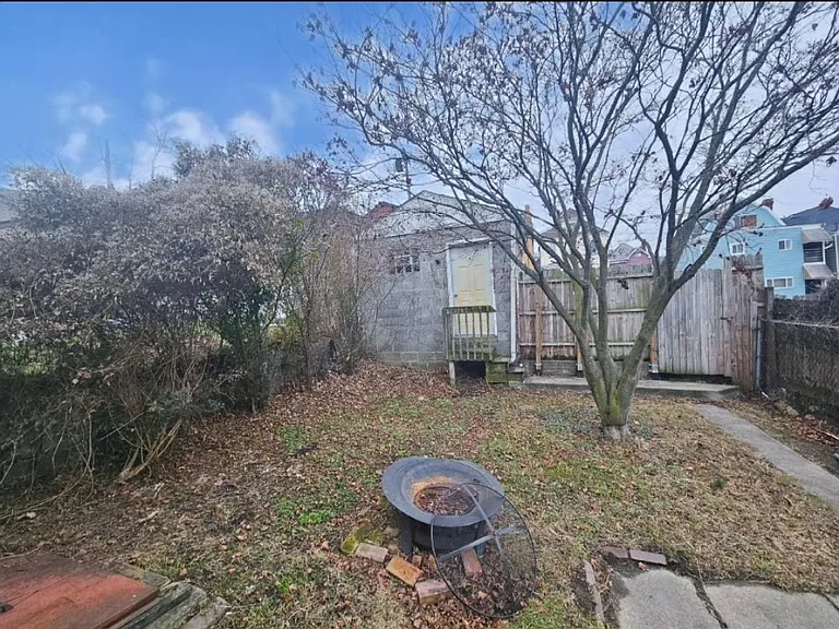 firepit and garage in the back