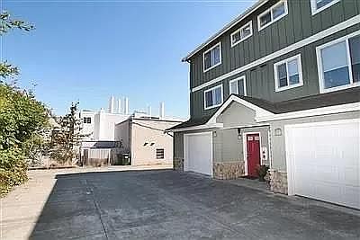 Garage and space outside garage available for parking.