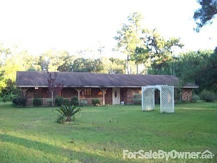 Front view Acadian style home