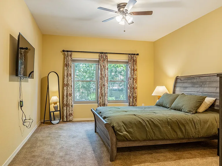 Pimary bedroom with queen bed, high end linens