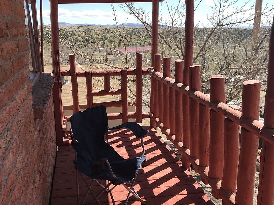 Front covered deck with view.