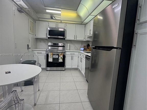 5th image of 10777 W Sample Rd APT 718