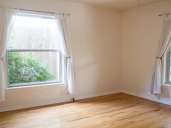 Large master bedroom with extra large windows