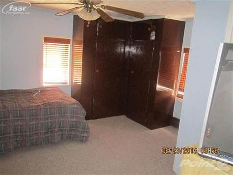 Bedroom with built in closet