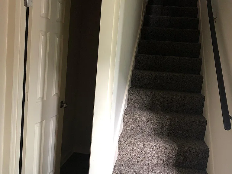 first floor storage,
stairs to 2nd floor