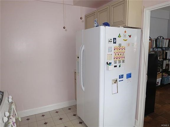 Kitchen with Light Fixture and Fan