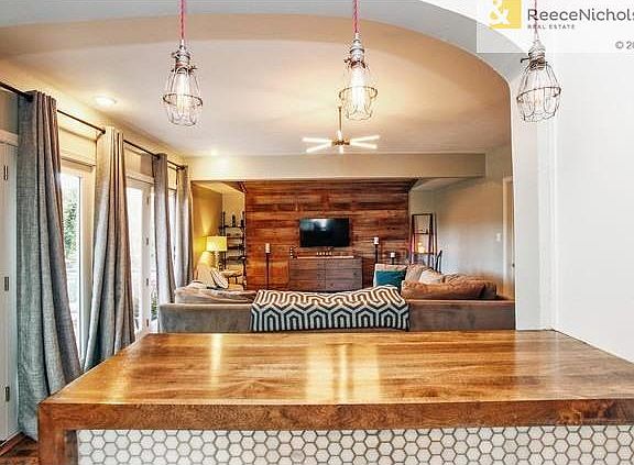 LOOKING INTO FAMILY ROOM FROM KITCHEN ISLAND
