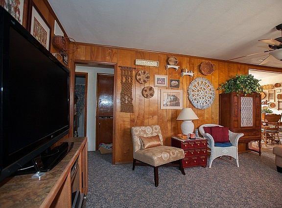 Living room is adjacent to kitchen