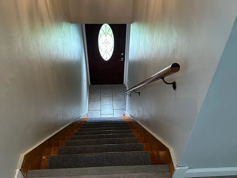 Staircase to front door