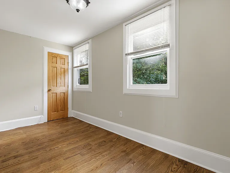 This bonus room boasts beautiful light and is perfect for an office.