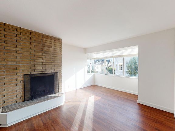 Wood burning fireplace in living room
