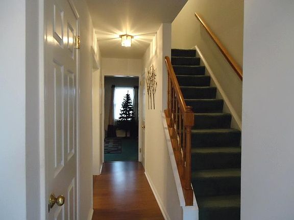 Hallway and Stairs to Upper Level