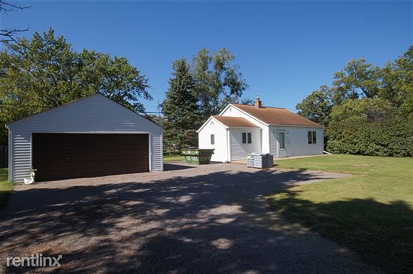 Two car garage and the house is getting a new roof