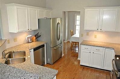 Kitchen. Granite counters & SS appliances with loads of counters and cabinets