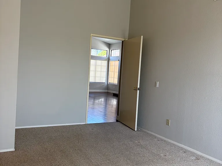 Spacious main bedroom - easily fits a King Bed with plenty of room to spare.
