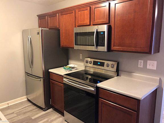 Kitchen - Microwave, Cooking Range & Refrigerator