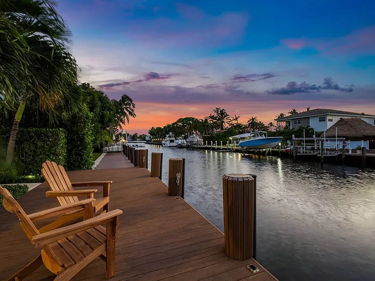 Private dock with captivating sunset views over Fort Lauderdale's peaceful canals.
